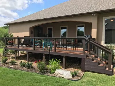 Enhanced Composite with Railings: San Antonio, TX — Deck Building & Repair project by Diamond Decks