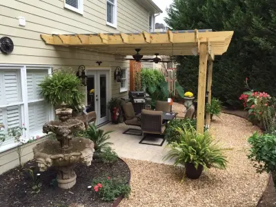 Enhanced pergola with rain and shade protection — Deck Building & Repair project by DeckThisOut