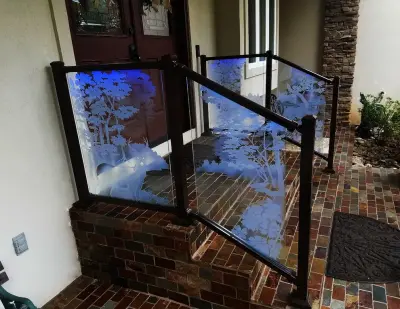 Engraved Glass Railing — Deck Building & Repair project by Smoky Mountain Deck Builders