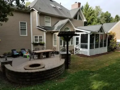 EZE Breeze Screened Porch Featuring Tongue and Groove Wood Flooring in Davidson, NC — Deck Building & Repair project by Deckscapes Inc