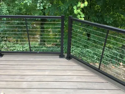 Feeney Cable Railing with Deckorators Composite Decking — Deck Building & Repair project by Unique Deck Builders