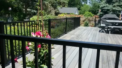 Gray Birch Fiberon Deck with TREX Signature Aluminum Railing — Deck Building & Repair project by The Deck Guy