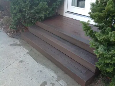Rosewood Fiberon Deck with TREX Transcend Vintage Lantern Railing — Deck Building & Repair project by The Deck Guy