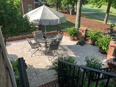 Greensboro Patio Layout Featuring Brick Base Wall and Tailored Railing — Deck Building & Repair project by Archadeck Piedmont Triad