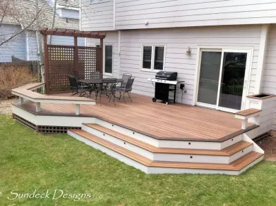 Evergrain deck at ground level — Deck Building & Repair project by Sundeck Designs LLC