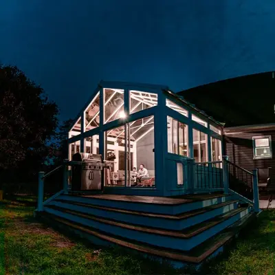 Hennessy Home - Ann Arbor, MI: LivingSpace Sunroom Extension — Deck Building & Repair project by Skyview Detroit