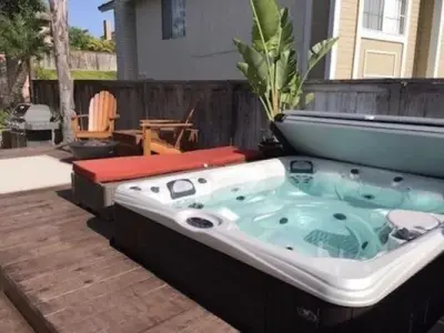 Modern Sunken Hot Tub for Backyard Oasis — Deck Building & Repair project by Recreation Unlimited