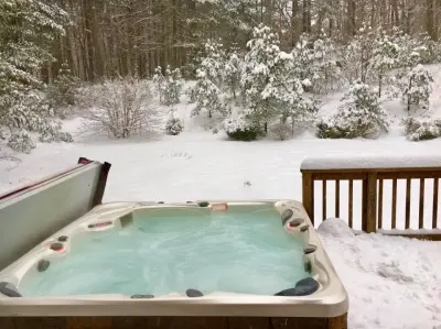 Rustic Design Hot Tubs — Deck Building & Repair project by Recreation Unlimited