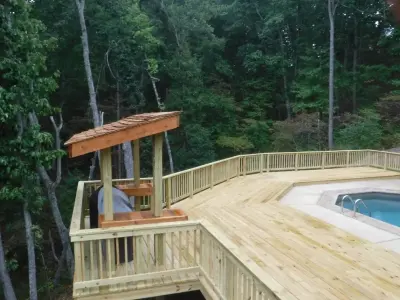 In-Ground Swimming Pool Deck — Deck Building & Repair project by Decks On A Budget