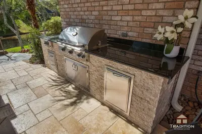 Outdoor Space Featuring Infinity Pool and Stone Steps — Deck Building & Repair project by Tradition Outdoor Living