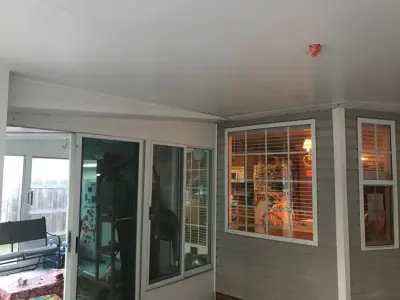 Enclosed Roof Screen Area Adjacent to Current Sun Room — Deck Building & Repair project by L3 Installer Services, LLC.