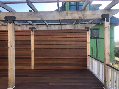Ipe deck featuring a pergola — Deck Building & Repair project by Epoch Construction LLC