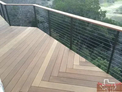 Ipe Wood Decking with Metal Support and Stainless Steel Cable Railing — Deck Building & Repair project by Austin Add-A-Deck