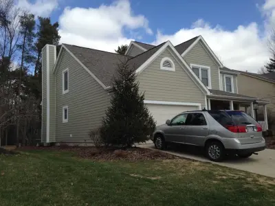 Monterey Taupe 7.25" James Hardie Siding with Driftwood Owens Corning Roof — Deck Building & Repair project by Ohio Exteriors