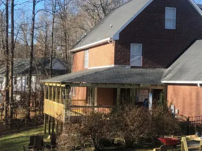 L-shaped sheltered patio — Deck Building & Repair project by Epoch Construction LLC
