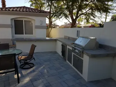 L-Shaped Personalized Outdoor Barbecue Space — Deck Building & Repair project by Outdoor Living Concepts