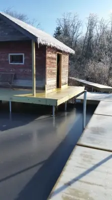 Waterfront Retreat — Deck Building & Repair project by Landmark Horticultural Management