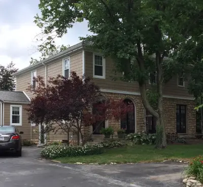 Lower Front Elevation with Landmark Chestnut Limestone — Deck Building & Repair project by Ohio Exteriors