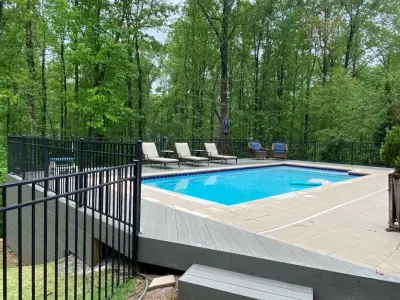 Poolside Deck Expansion with Minimal Upkeep in Mountain Brook AL — Deck Building & Repair project by Archadeck Of Birmingham