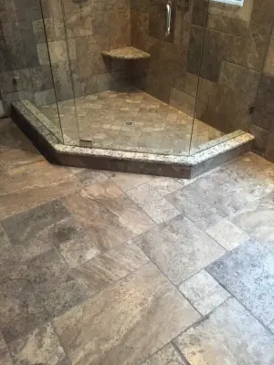 Renovation of Master Bathroom with Silver Travertine Tile — Deck Building & Repair project by Premier Stone Outdoor Living