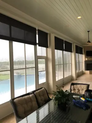 Merritt Island Enclosed Screen Room with Tinted Vinyl Windows and Solar Shades — Deck Building & Repair project by Shade Solutions By JK Studio Designs, Inc.