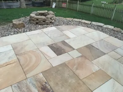 Missouri Patios with Fire Pit, Integrated Steps, and Outdoor Lighting — Deck Building & Repair project by Kansas City Hardscapes