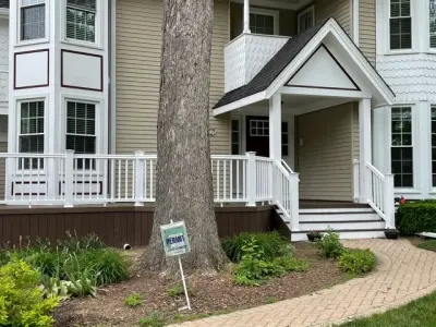 Mocha TimberTech Deck with White Radiance Railings in Wheaton, IL — Deck Building & Repair project by Archadeck Of Chicagoland