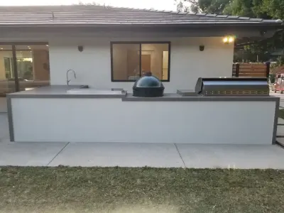 Contemporary L-shaped island in Garanda Hills — Deck Building & Repair project by L.A. Custom Grill Islands