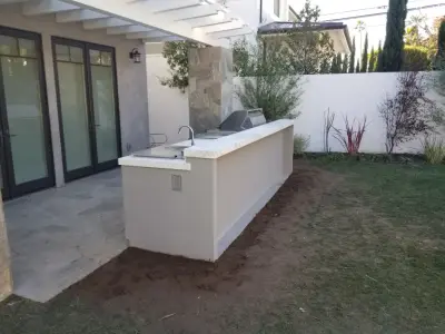 Contemporary L-shaped island in Manhattan Beach — Deck Building & Repair project by L.A. Custom Grill Islands