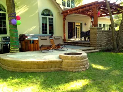 Tiered Patio featuring Fire Pit and Pergola in Libertyville, IL — Deck Building & Repair project by Archadeck Of Chicagoland