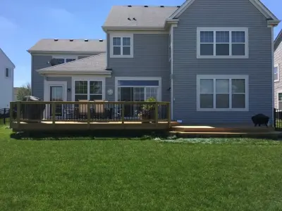 Multi-Tiered Wooden Deck Design by Archadeck of Chicagoland — Deck Building & Repair project by Archadeck Of Chicagoland