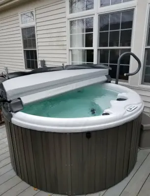 Accessible Circular Hot Tub with Hand Rail — Deck Building & Repair project by Recreation Unlimited
