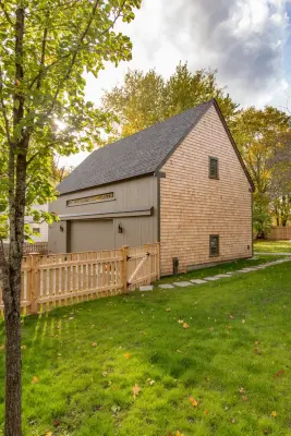 Classic Village Carriage Cottage by Cummings Architecture + Interiors