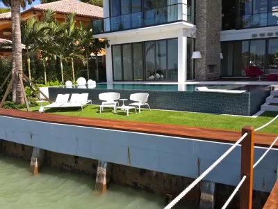 Artificial Grass & Lounge Areas — Landscape Construction project by Southwest Greens Of Florida in Jupiter