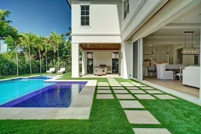 Grass Paver Strips & Luxury Pool by Southwest Greens Of Florida