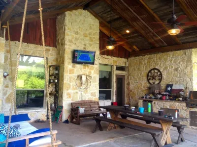 Dallas, TX - Rustic Back Porch — Landscape Construction project by Star Of Texas Landscape