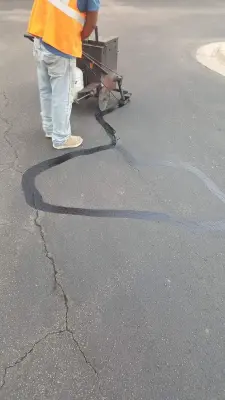 Texan Paving Asphalt Pothole Repair and Crack Sealing by Texan Paving