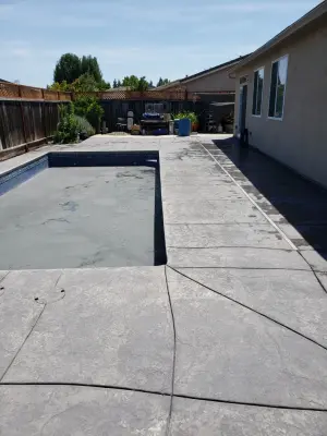 textured concrete pool deck — Driveway Repair & Paving project by Craftsman Construction Lic.1030935