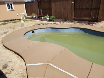 pool decking project — Driveway Repair & Paving project by Craftsman Construction Lic.1030935