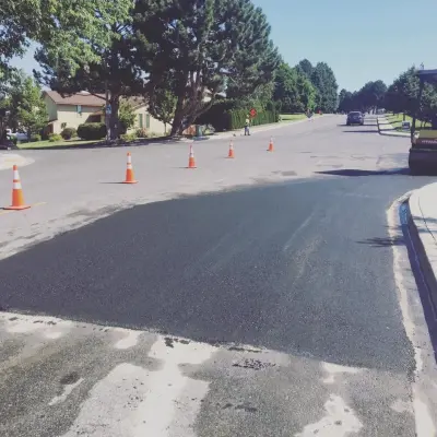 Asphalt repair — Driveway Repair & Paving project by Knockout Pavement Services