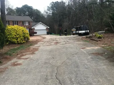 Lilburn, GA Landscaping | Concrete Driveway Installation | Sod Application — Driveway Repair & Paving project by GW Concrete & Landscaping