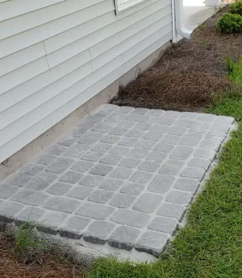 Waste Bin Mat — Driveway Repair & Paving project by Southern Shores Hardscape/Paver Design