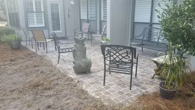 Driveway Golf Cart Pad Expansion and Back Patio Paver Installation — Driveway Repair & Paving project by Saddi - Cleaning & Construction INC