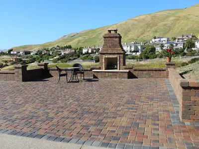 Outdoor fireplace patio — Driveway Repair & Paving project by Select Pavers