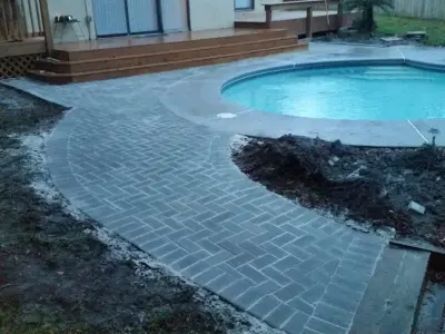 Back Patio Pool Paver Installation — Driveway Repair & Paving project by Saddi - Cleaning & Construction INC