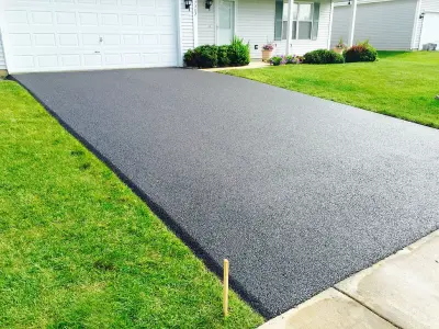 Driveway Paving with Asphalt and Sealant — Driveway Repair & Paving project by Premium Paving Inc