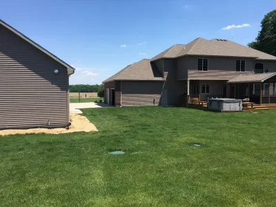 Paver Patio w/fire pit — Landscape Construction project by Superior Hardscapes