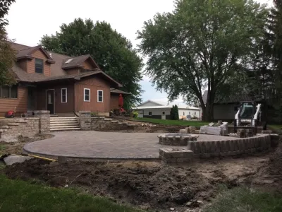 Paver Patio w/fire pit & seat wall — Landscape Construction project by Superior Hardscapes