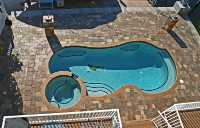 Brick Paver Pool Deck — Driveway Repair & Paving project by Exotic Pavers