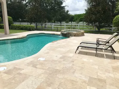 Travertine for Pool Decks — Driveway Repair & Paving project by Exotic Pavers